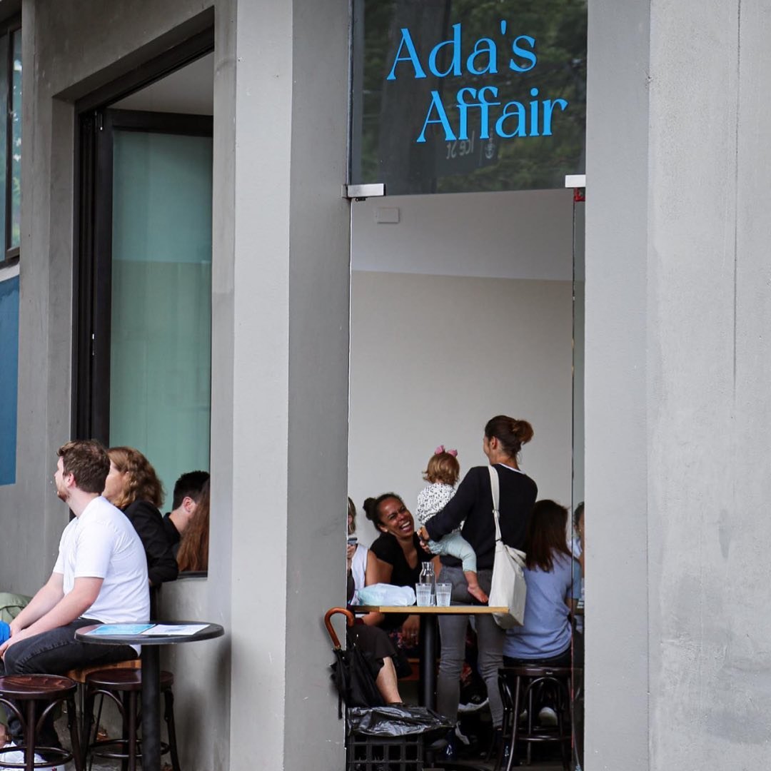 Ada’s Affair signage over a busy café