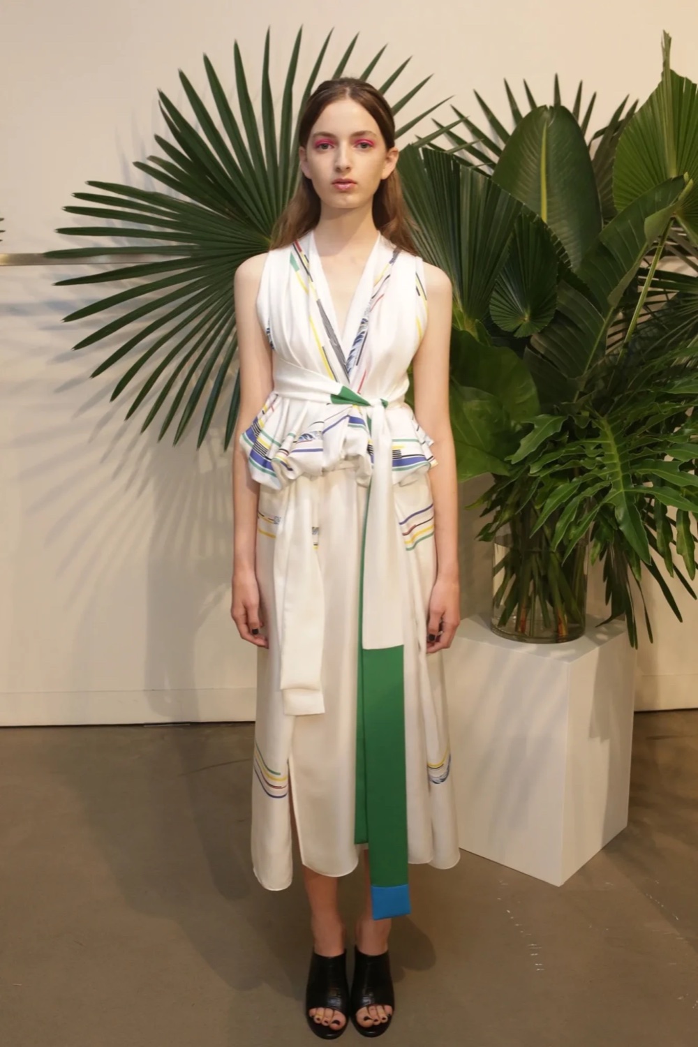 White wrap top and skirt with stripe print and green tie